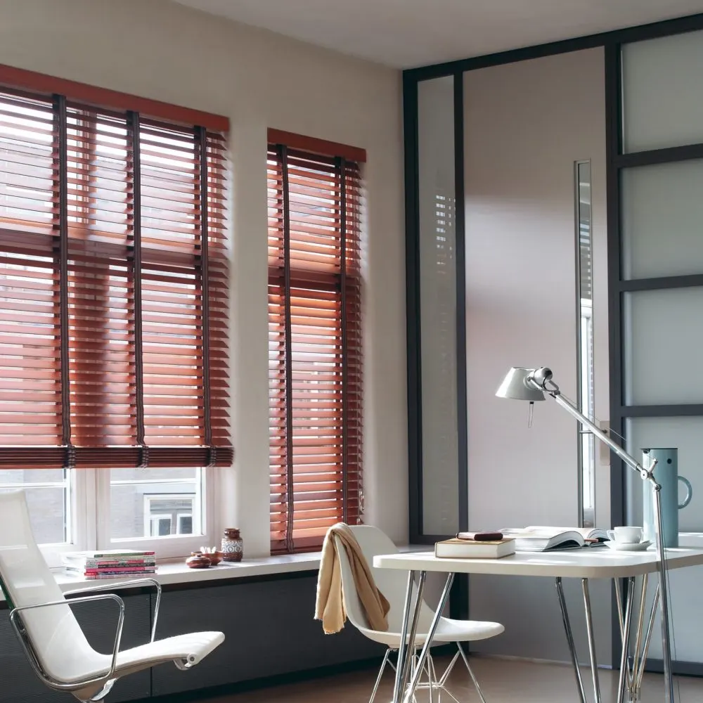 Office window with sleek gray blinds in Uae