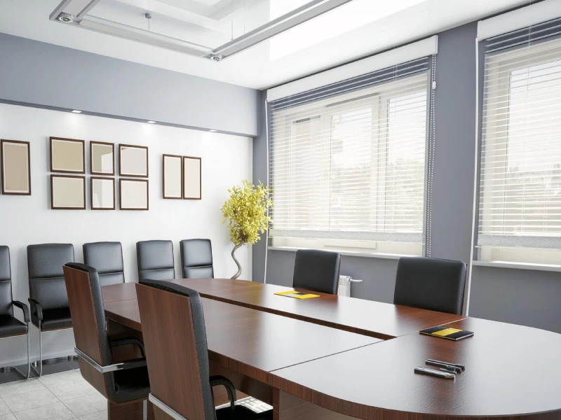 bank office with sleek horizontal blinds filtering natural light